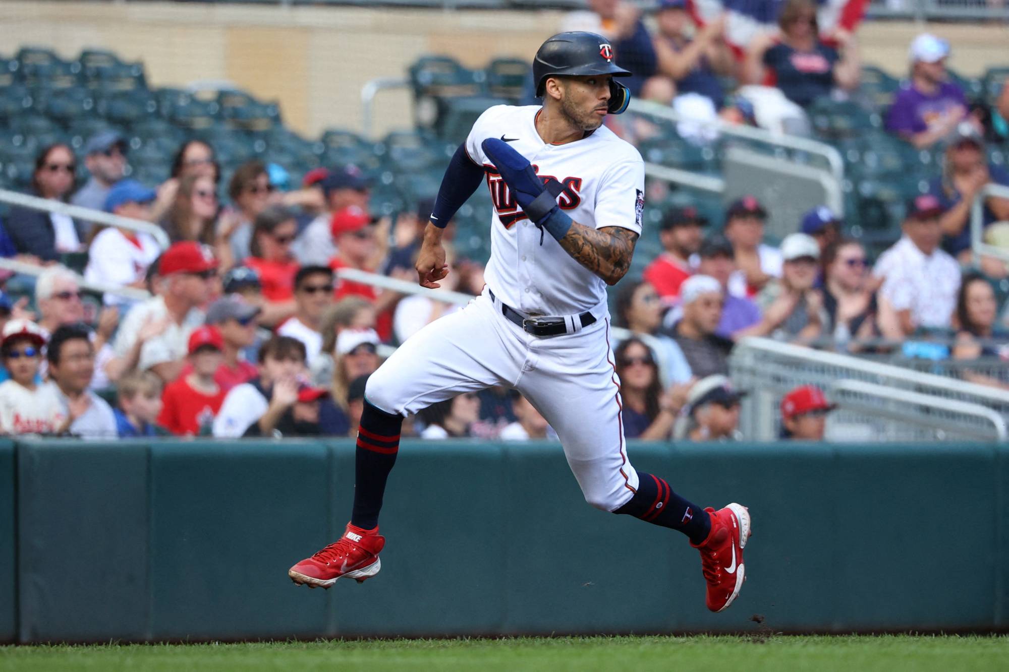 Minnesota Twins shortstop Carlos Correa runs home to score against the Los Angeles Angels at Target Field in Minnesota on Sept. 25.  | USA TODAY / VIA REUTERS