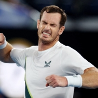 Andy Murray celebrates after winning his first-round match against Matteo Berrettini at the Australian Open in Melbourne on Tuesday. | REUTERS