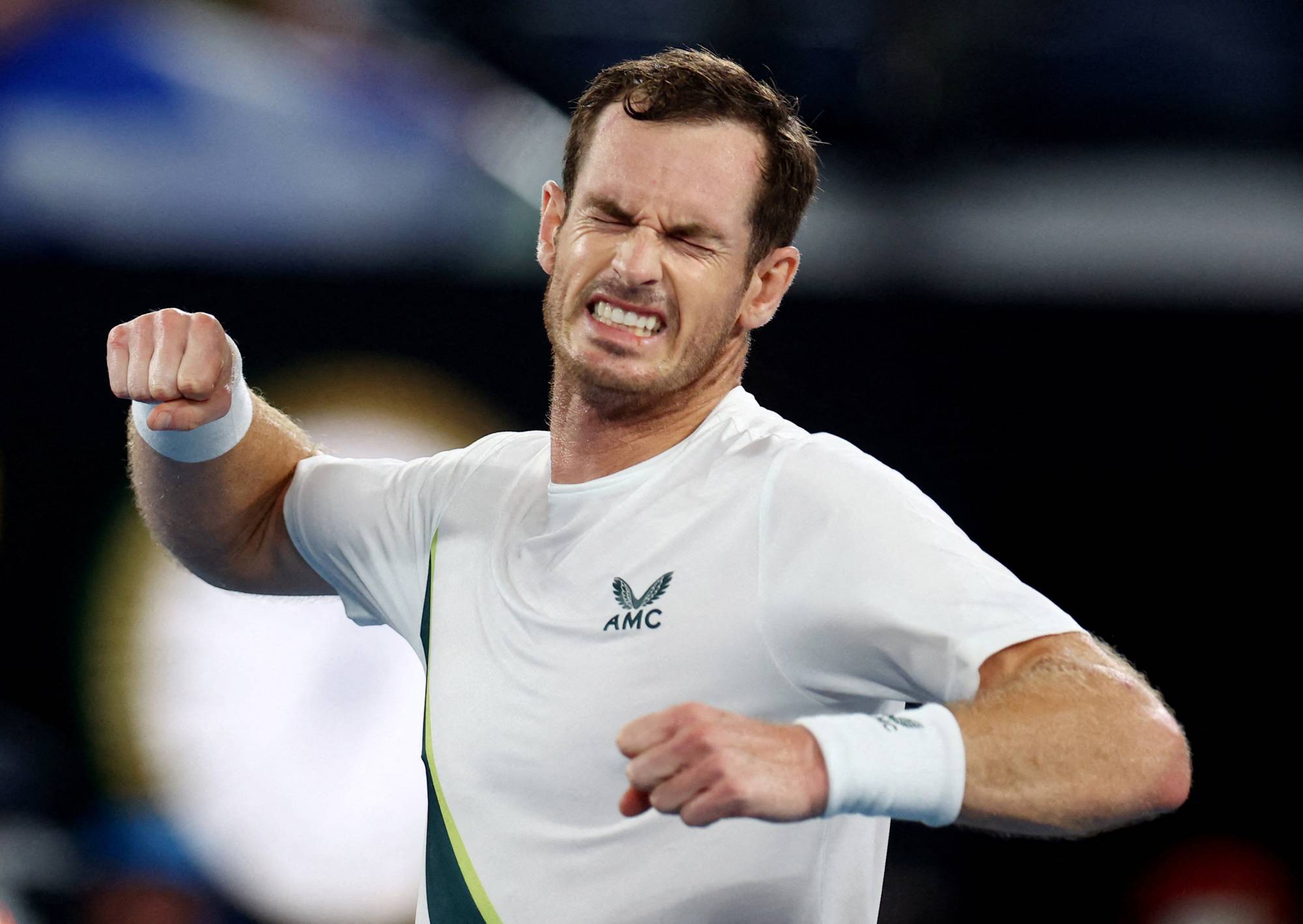 Andy Murray celebrates after winning his first-round match against Matteo Berrettini at the Australian Open in Melbourne on Tuesday. | REUTERS