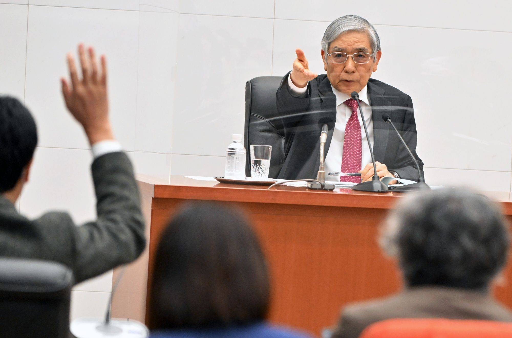 Bank of Japan Gov. Haruhiko Kuroda holds a news conference in Tokyo on Wednesday. | THE MAINICHI / BLOOMBERG