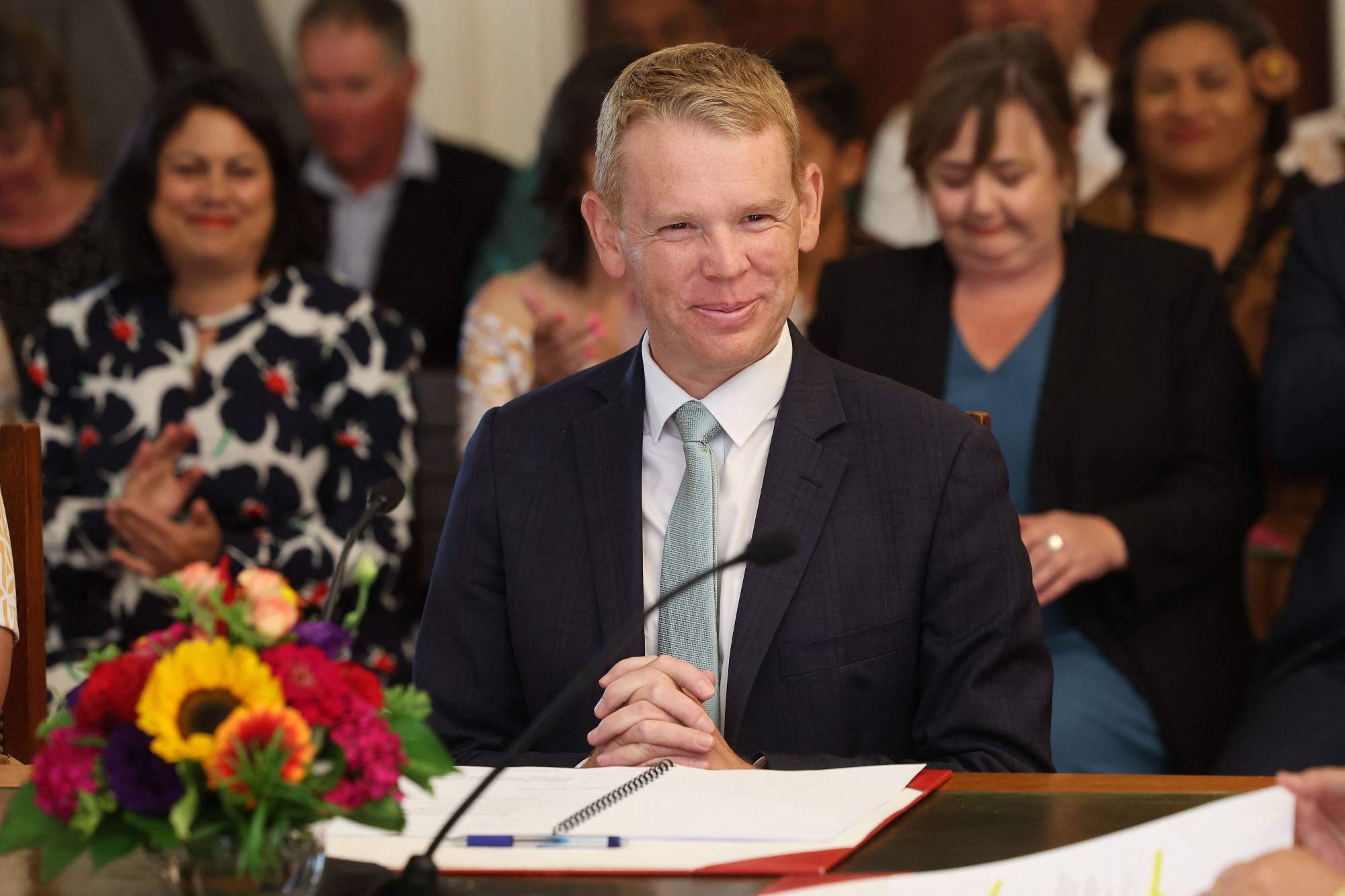 New Zealand's new prime minister, Chris Hipkins, is sworn in during a ceremony at Government House in Wellington on Wednesday. | AFP-JIJI