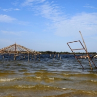 A general view of the submerged tourism businesses at the Pink Lake in Niaga, near Dakar, Senegal. | REUTERS