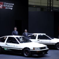 Akio Toyoda (right) and Koji Sato pose for a photograph at an annual Tokyo Auto Salon event in Chiba on Jan. 13. | BLOOMBERG