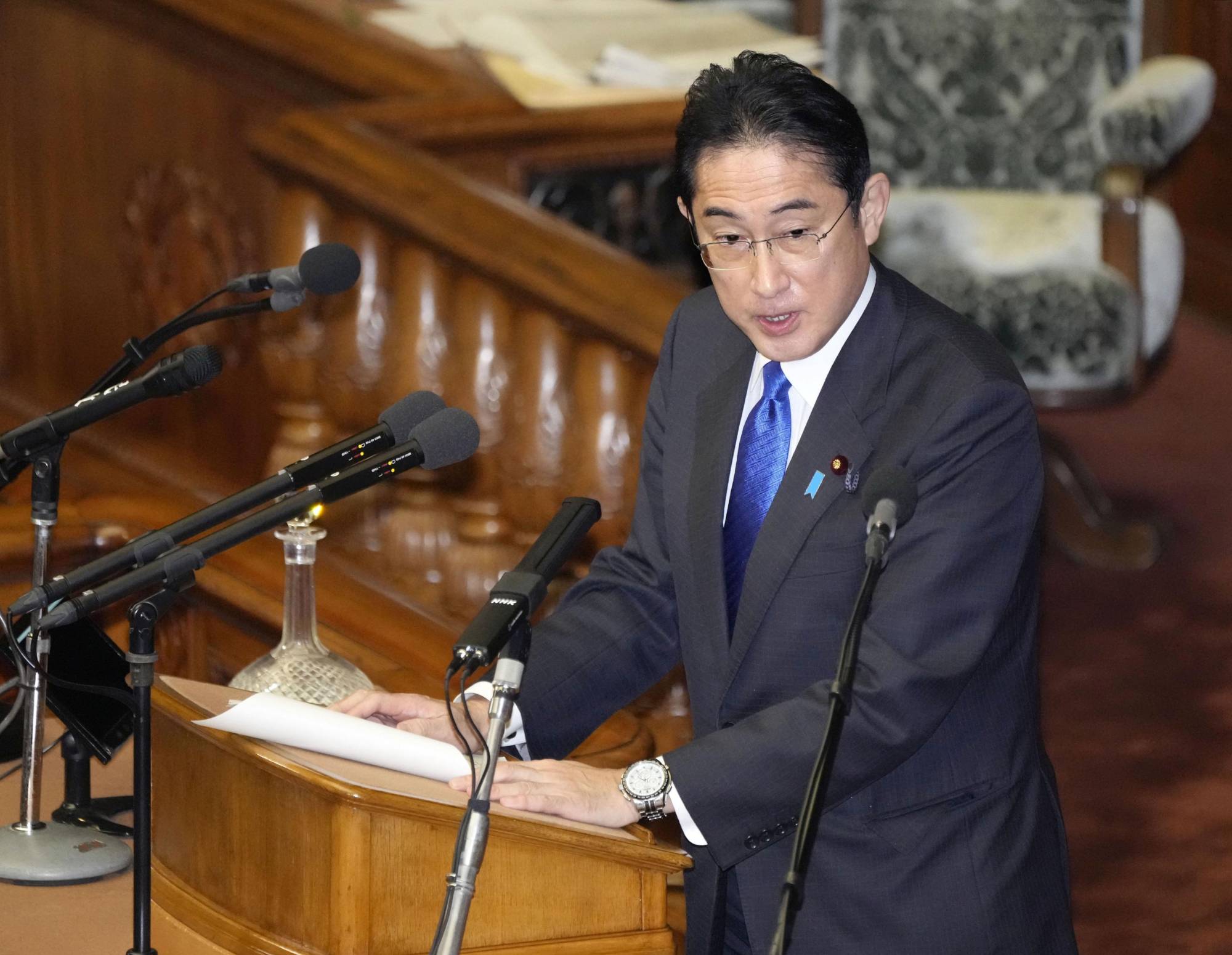 Prime Minister Fumio Kishida speaks during a parliament session on Thursday. | KYODO