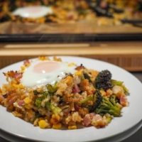 Great as a side or, with added egg, as a meal on its own, this oven-fried rice is as flexible a recipe as they come. | SIMON DALY       
