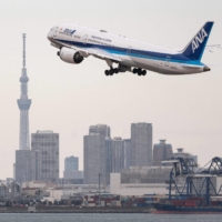 An All Nippon Airways plane takes off from Haneda Airport in Tokyo on Thursday.  | AFP-JIJI