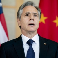 U.S. Secretary of State Antony Blinken attends a meeting with then-Chinese Foreign Minister Wang Yi in Nusa Dua on the Indonesian resort island of Bali last July. | POOL / VIA AFP-JIJI