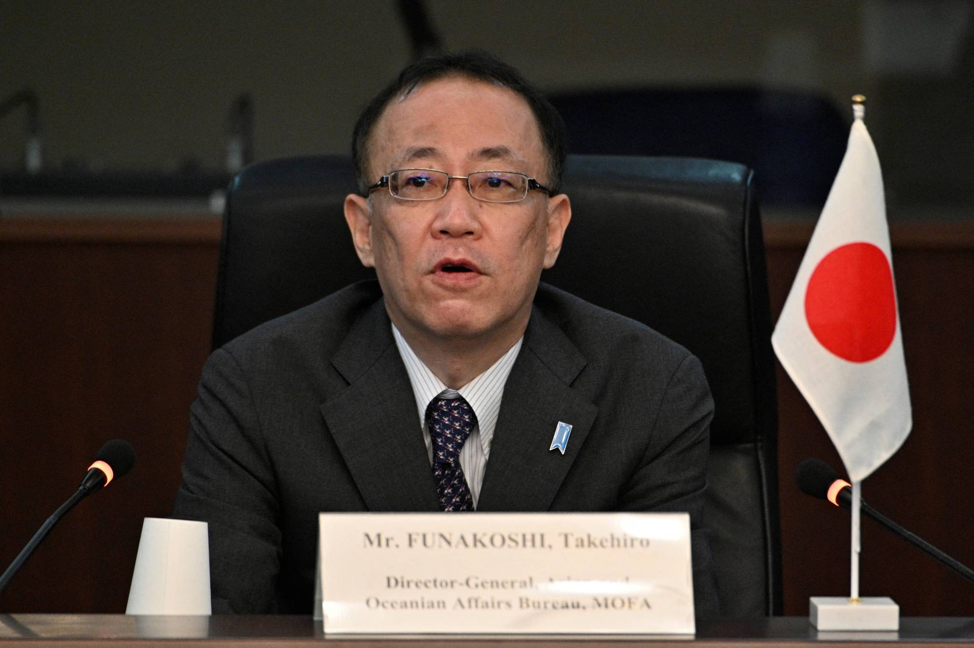 The Foreign Affairs Ministry's director-general for Asian and Oceanian affairs, Takehiro Funakoshi, speaks during a Japan-U.S.-South Korea trilateral meeting in Tokyo in September. | POOL / VIA REUTERS