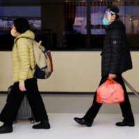 Japanese airline association to make onboard mask wearing optional