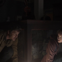 Pedro Pascal (left) and Bella Ramsey star in HBO\'s \"The Last of Us,\" a series based on a video game of the same title. | COURTESY OF HBO
