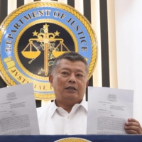 Philippines Justice Secretary Jesus Crispin Remulla speaks during a news conference in Manila on Tuesday. | KYODO