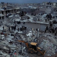 Damaged buildings and rescue operations are seen in the aftermath of the earthquake, in Aleppo on Tuesday. | WHITE HELMETS / VIA REUTERS