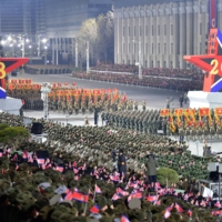 Troops take part in a military parade in Pyongyang on Wednesday. | KCNA / VIA REUTERS    