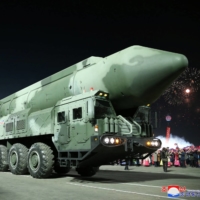A mock-up of an apparently new solid-fueled intercontinental ballistic missile is displayed during a military parade to mark the 75th founding anniversary of North Korea\'s army, at Kim Il Sung Square in Pyongyang on Wednesday. | KCNA / VIA REUTERS  