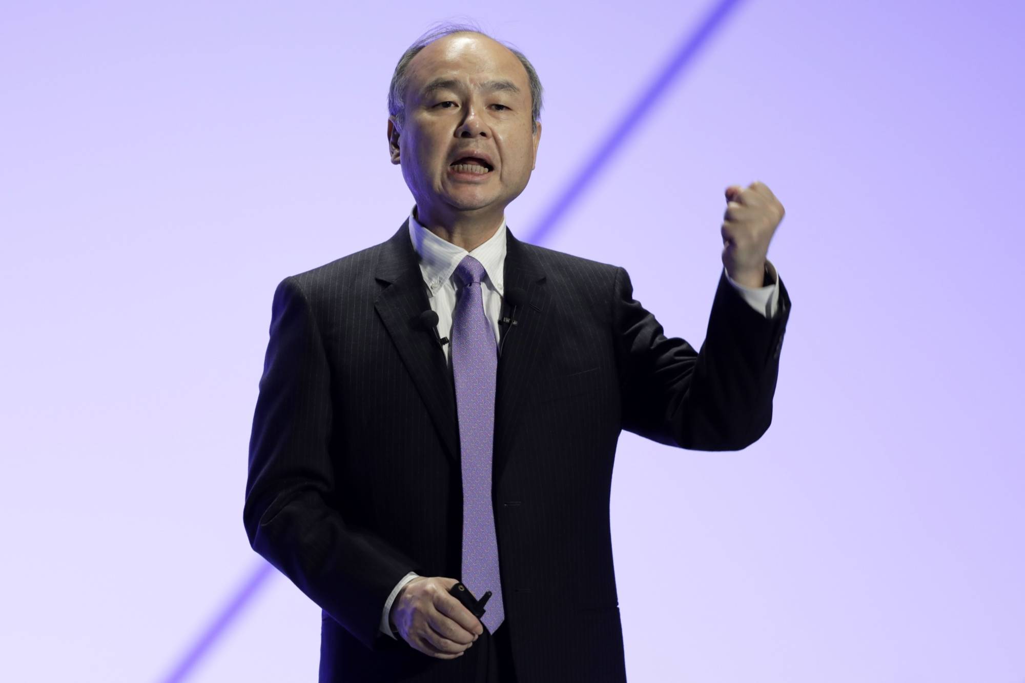 SoftBank's Vision Funds dropped a combined $5 billion in the December quarter and they’re net losers since inception, which has put the companies CEO and founder, Masayoshi Son, and his management team in a bind. | BLOOMBERG