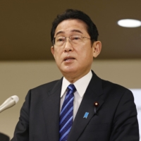 Prime Minister Fumio Kishida speaks to reporters in Toda, Saitama Prefecture, on Friday. | KYODO