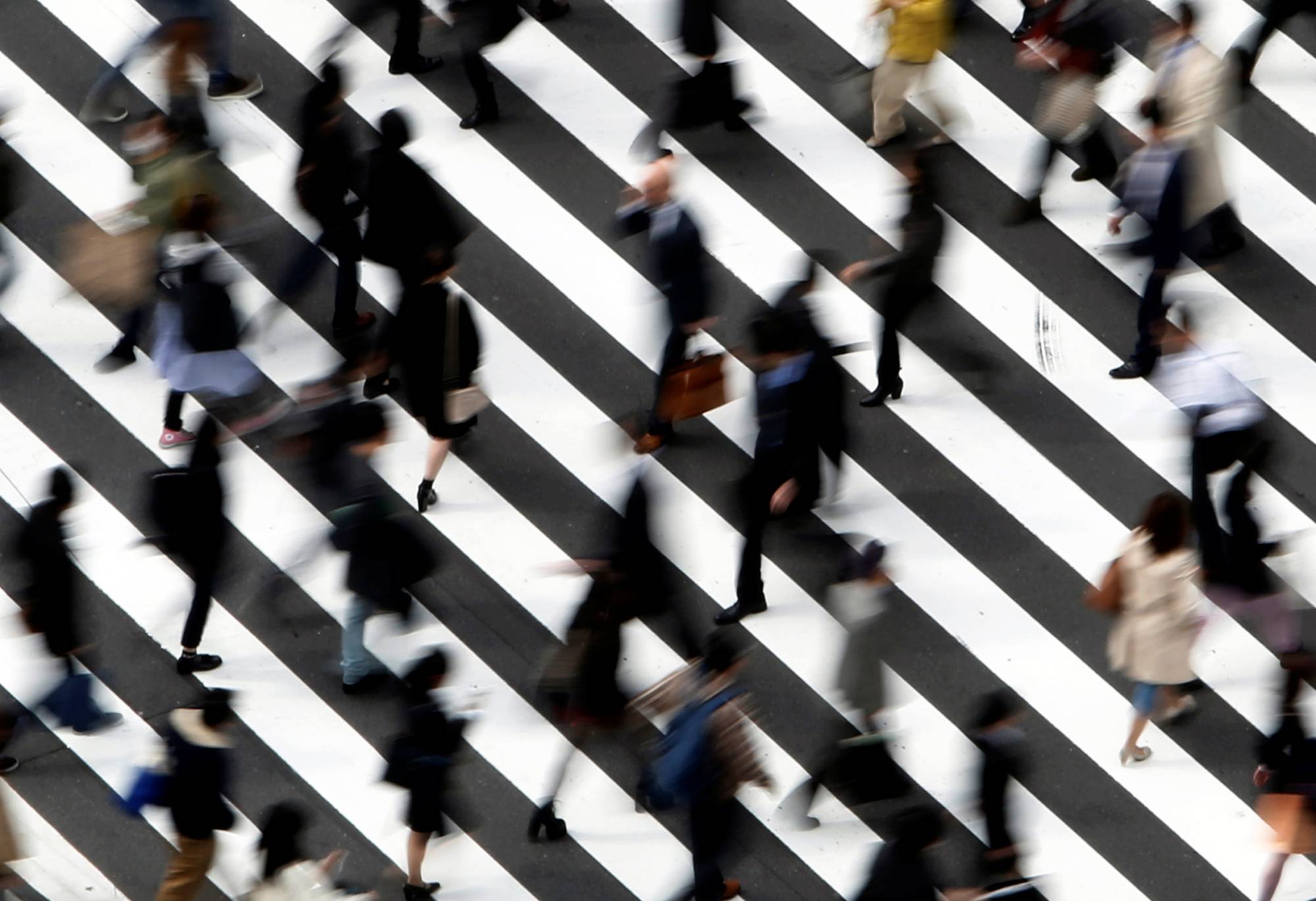 Japan’s stubbornly static wages have been one of the greatest mysteries in the nation’s shrinking labor market. | REUTERS