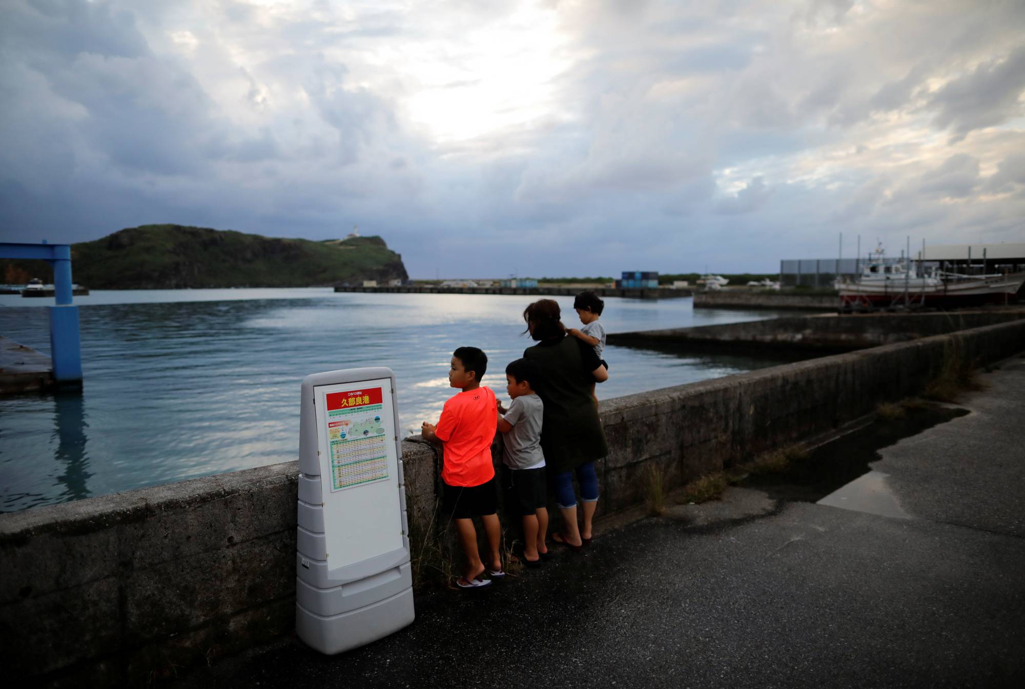 A young family in Yonaguni, Okinawa Prefecture in 2021. Japan's public expenditures related to family support stood at 2.01% of GDP in fiscal 2020.  | REUTERS