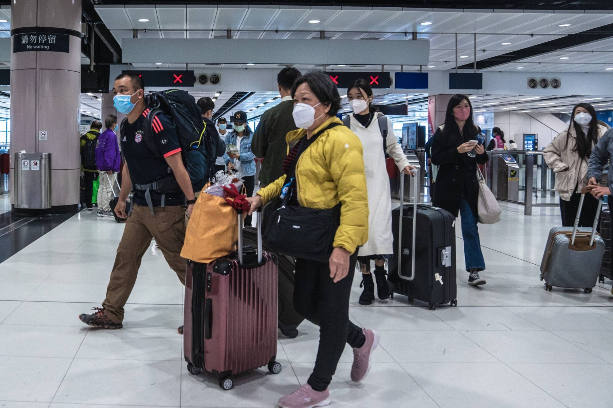Travelers from mainland China have visited Hong Kong in droves since border restrictions were lifted last week. | BLOOMBERG