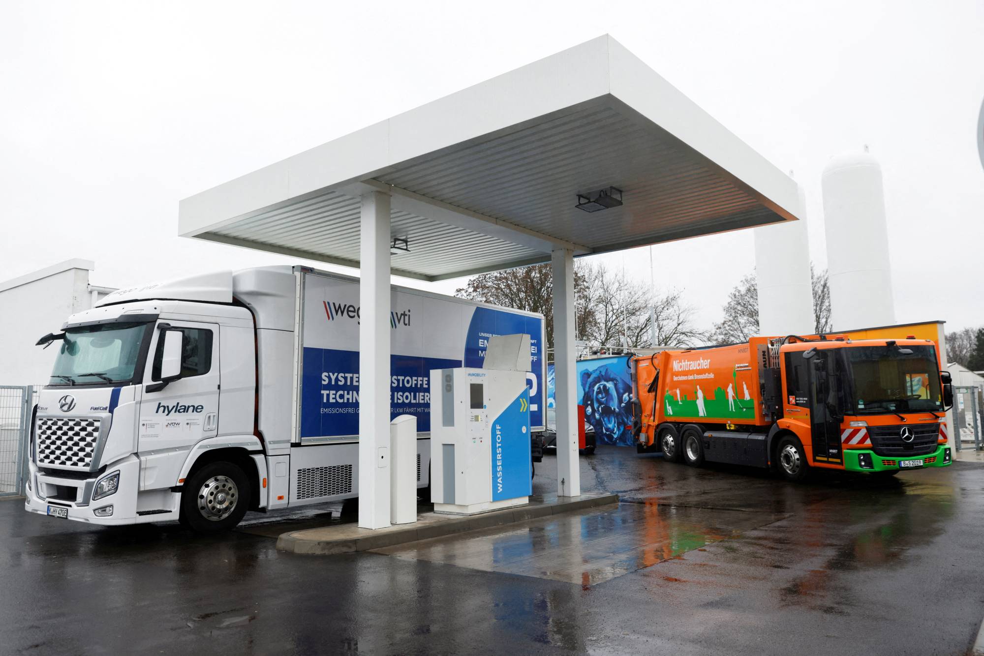 A Hyundai Xcient Fuel cell hydrogen truck refuels at a Hydrogen H2 Filling station for trucks and cars in Berlin. | REUTERS
