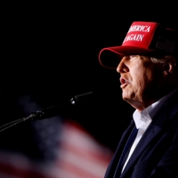 Former U.S. President Donald Trump speaks during a rally at Florence Regional Airport in Florence, South Carolina, in March 2022. | REUTERS
