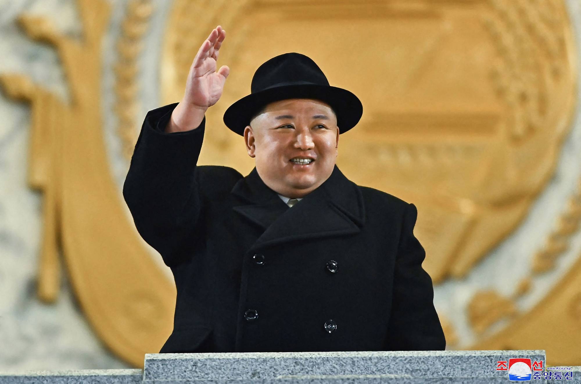 North Korean leader Kim Jong Un observes a military parade celebrating the 75th anniversary of the founding of the Korean People's Army in Pyongyang in this photo released on Feb. 9. | KCNA / KNS / VIA AFP-JIJI