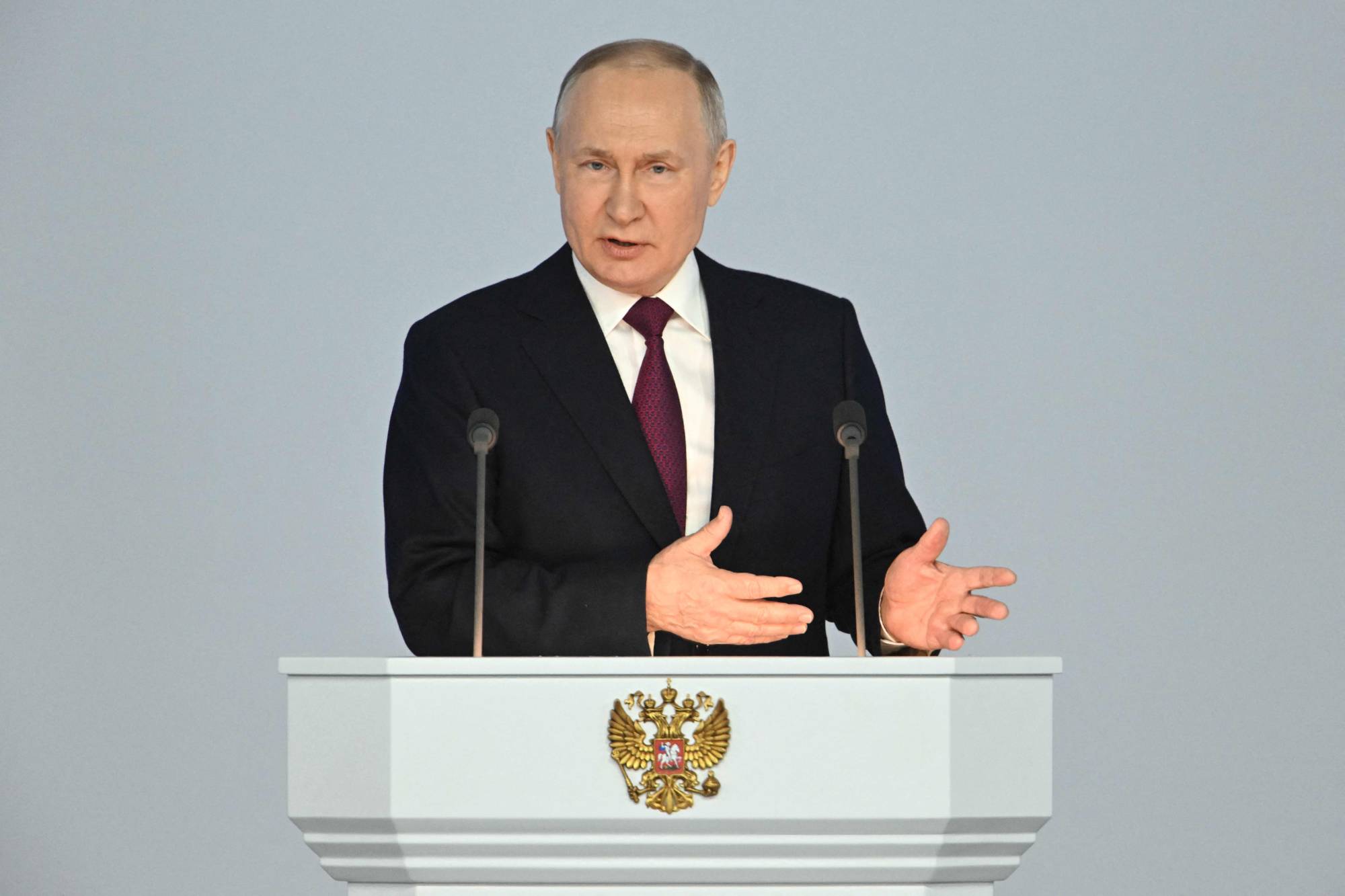 Russian President Vladimir Putin delivers his annual state of the nation address at the Gostiny Dvor conference center in Moscow on Tuesday. | SPUTNIK / VIA AFP-JIJI