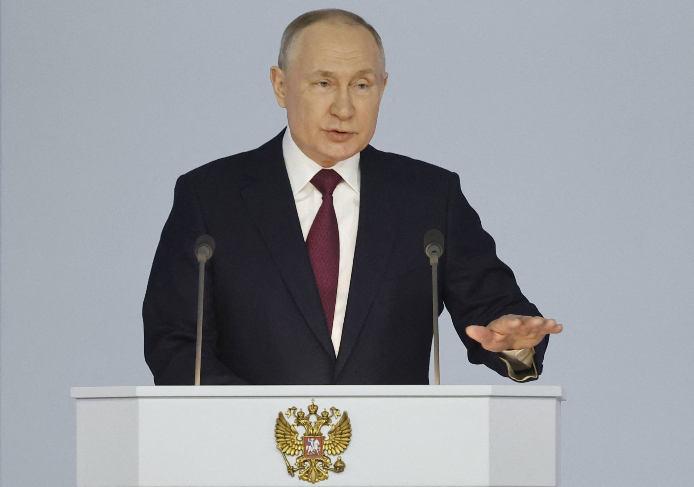 Russian President Vladimir Putin delivers his annual state of the nation address at the Gostiny Dvor conference center in central Moscow on Tuesday.  | SPUTNIK / VIA AFP-JIJI