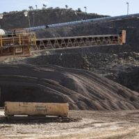 Piles of crushed ore at the Mountain Pass mine, operated by MP Materials, in Mountain Pass, California, in June 2019 | BLOOMBERG