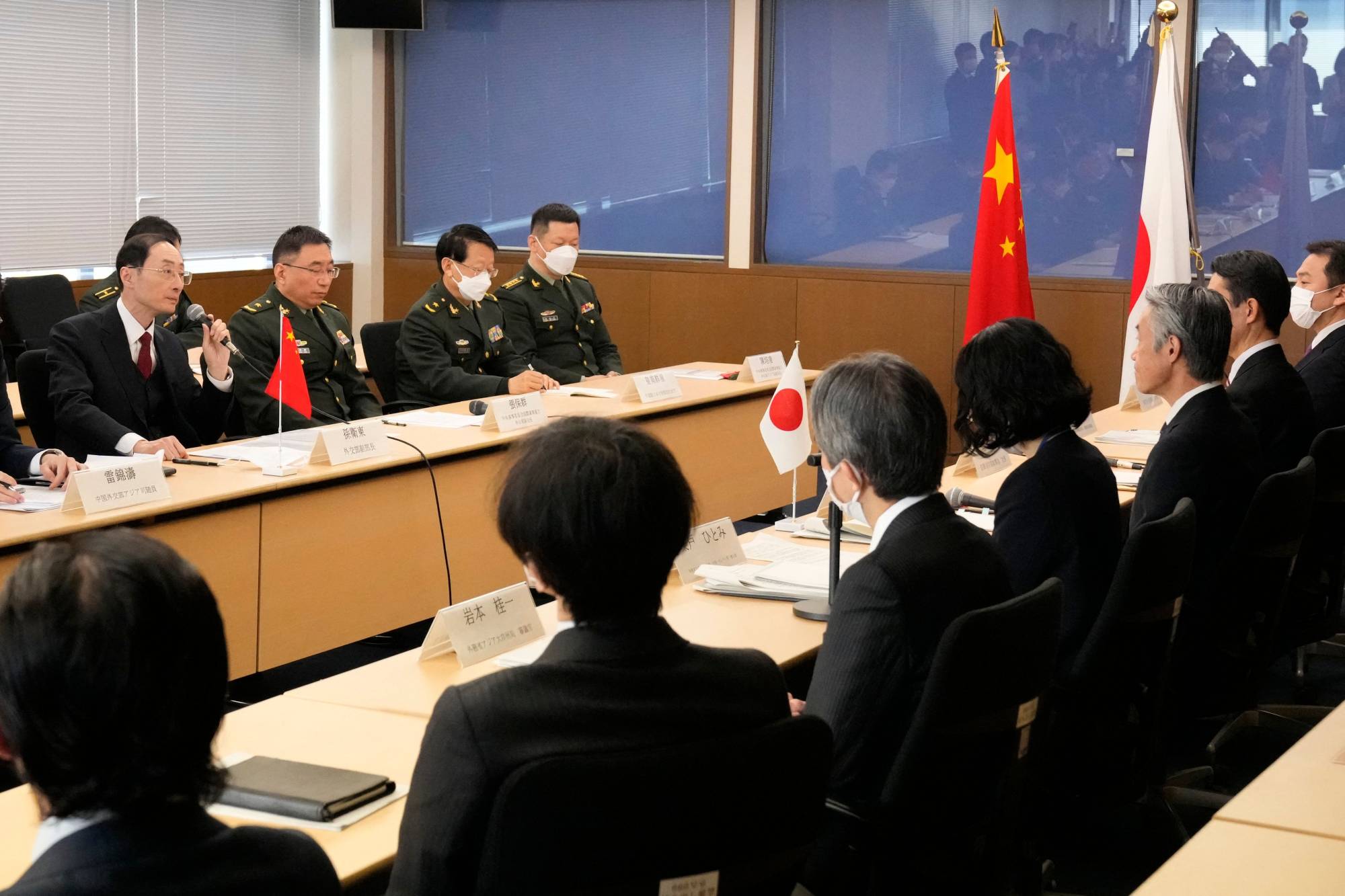 Senior Japanese and Chinese officials hold their first security dialogue in four years on Wednesday at the Foreign Ministry in Tokyo. | POOL / VIA AFP-JIJI