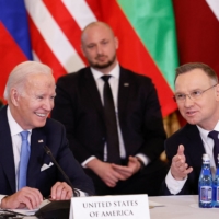 U.S. President Joe Biden speaks with Polish President Andrzej Duda at the Presidential Palace in Warsaw on Wednesday.  | REUTERS 