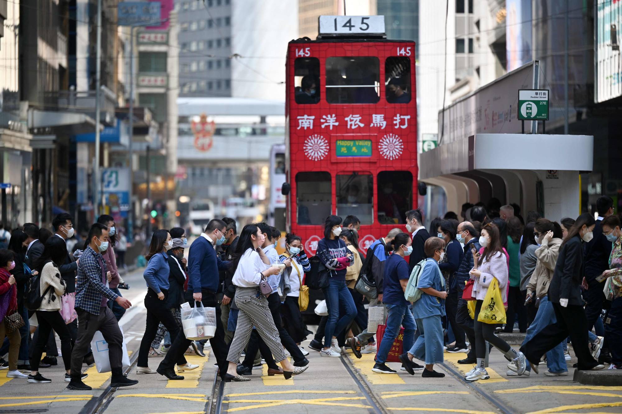The Central district of Hong Kong on Tuesday. The government's decision to retain a mask mandate makes the city stand out among global financial centers.  | AFP-JIJI 