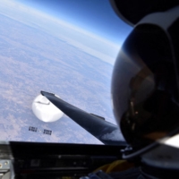 A U.S. Air Force U-2 pilot looks down at the suspected Chinese surveillance balloon as it hovers over the central United States on Feb. 3. | U.S. AIR FORCE / DEPARTMENT OF DEFENSE / VIA REUTERS