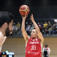 Yuki Kawamura takes a shot during Japan\'s game against Iran in Takasaki, Gunma Prefecture, on Thursday. | KYODO