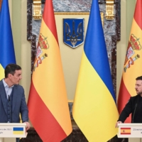 Ukrainian President Volodymyr Zelenskyy and Spanish Prime Minister Pedro Sanchez attend a joint news briefing in Kyiv on Thursday. | REUTERS