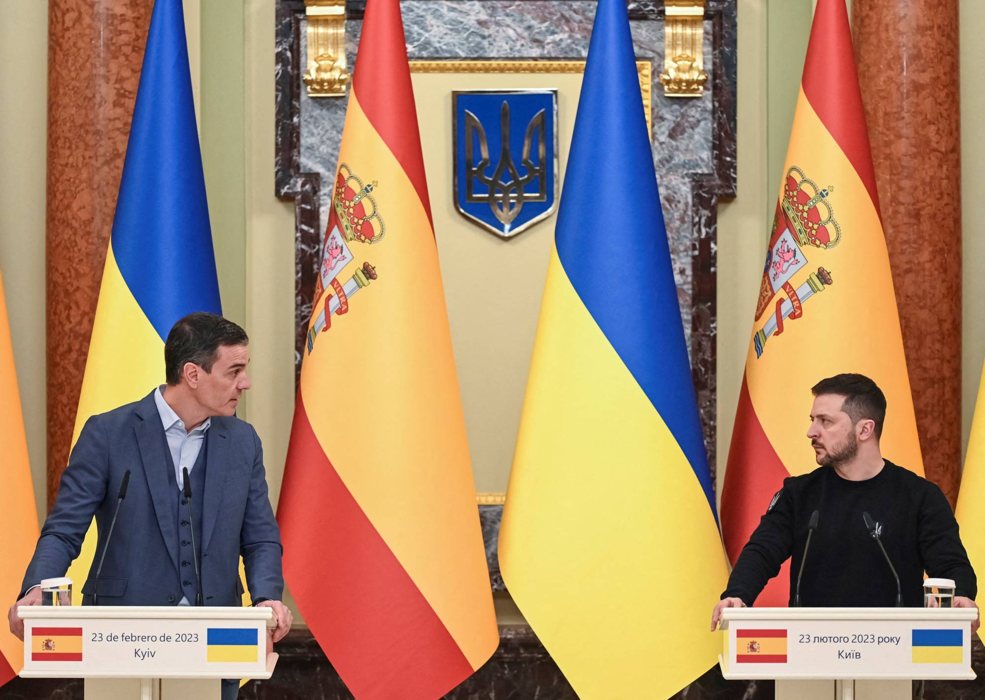 Ukrainian President Volodymyr Zelenskyy and Spanish Prime Minister Pedro Sanchez attend a joint news briefing in Kyiv on Thursday. | REUTERS