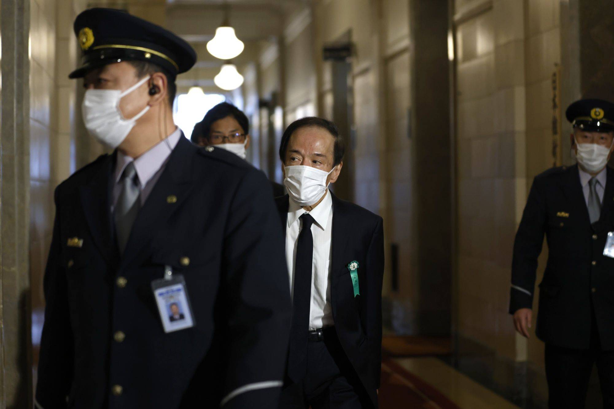 Kazuo Ueda, nominee for the governor of the Bank of Japan, arrives at the Parliament in Tokyo on Friday. | BLOOMBERG