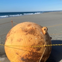 Buoys resembling the one found in Japan are typically made of steel and are often used for mooring ships in harbors or at sea. They usually float on the surface, unlike other buoys that can withstand the pressures of deeper water. | TWITTER / @XMIS10C4M6QTHSG / VIA REUTERS