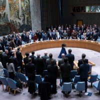 Representatives observe a minute of silence during a meeting at the United Nations Security Council in New York to mark one year since Russia\'s invasion of Ukraine. | REUTERS