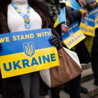 Demonstrators protest against Russia\'s year-long invasion of Ukraine in Washington on Saturday. | BLOOMBERG