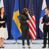 U.S. Vice President Kamala Harris speaks with Finland Prime Minister Sanna Marin and Swedish Prime Minister Ulf Kristersson during the Munich Security Conference on Feb. 18.  | REUTERS