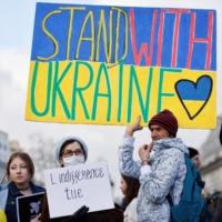 Protesters demonstrate to show solidarity with Ukraine at a rally in Paris on Saturday.   | REUTERS