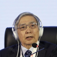 Bank of Japan Gov. Haruhiko Kuroda speaks during a news conference at the Group of 20 finance ministers and central bank governors meeting in Bengaluru, India, on Thursday. | BLOOMBERG