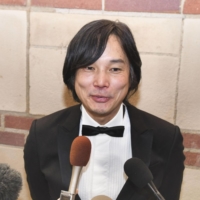 Daisuke Tsutsumi, director of \"Oni: Thunder God\'s Tale,\" speaks to reporters in Los Angeles on Saturday after the series won two prizes in the TV and Media category at the annual Annies. | KYODO