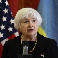 U.S. Treasury Secretary Janet Yellen addresses students during her visit to Kyiv on Monday. | AFP-JIJI