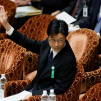 Shinichi Uchida, a nominee for the Bank of Japan deputy governor, says the bank should maintain monetary easing during a confirmation hearing in the Upper House on Tuesday. | REUTERS