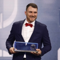 Polish amputee soccer player Marcin Oleksy receives the Puskas Award, given to the scorer of the year\'s best goal, during the Best FIFA Football Awards ceremony in Paris on Monday. | REUTERS