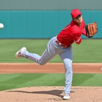 Shohei Ohtani pitches for the Angels against the Athletics during a spring training game in Mesa, Arizona, on Tuesday. | USA TODAY / VIA REUTERS