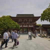 Tourists visit the Dazaifu Tenmangu Shrine in Dazaifu, Fukuoka, in May.  | BLOOMBERG