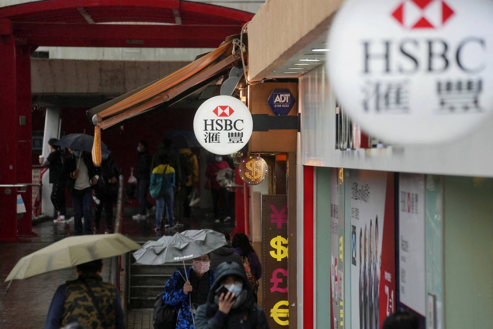 An HSBC bank branch in Hong Kong in February 2022. Last month, British lawmakers found HSBC complicit in Hong Kong human rights abuses for siding with authorities and denying pension payments to those who had left the city. | REUTERS
